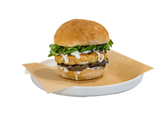 Panino con fish-burger di orata, melanzane sott’olio, songino e maionese al polpo e lime.